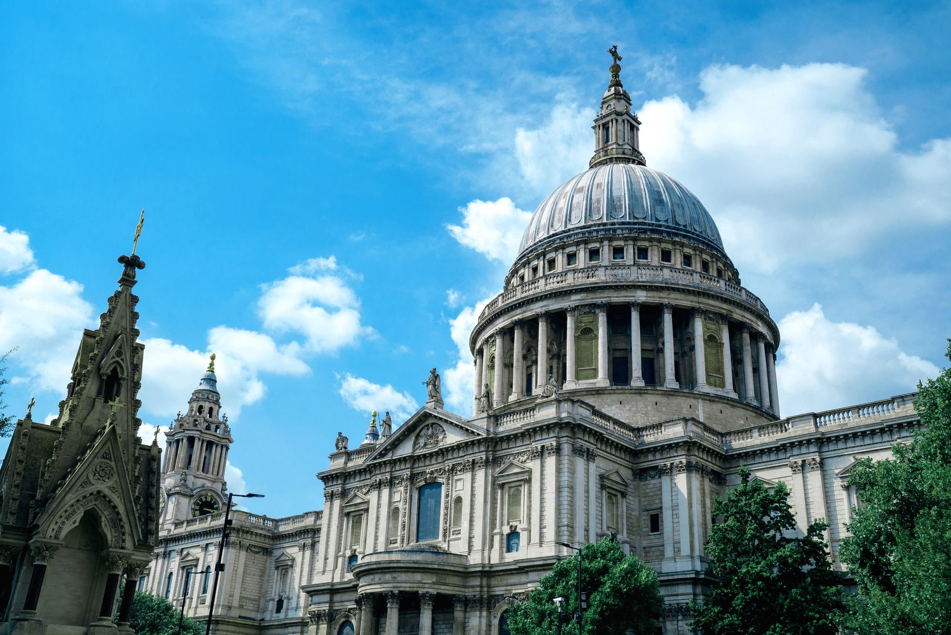 The dome of St Paul's Cathedral above the City of London at golden hour
